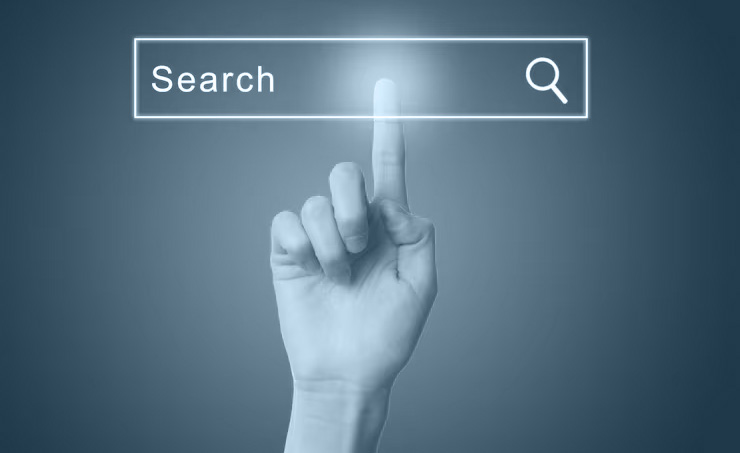 photograph of a touch display showing a search engine