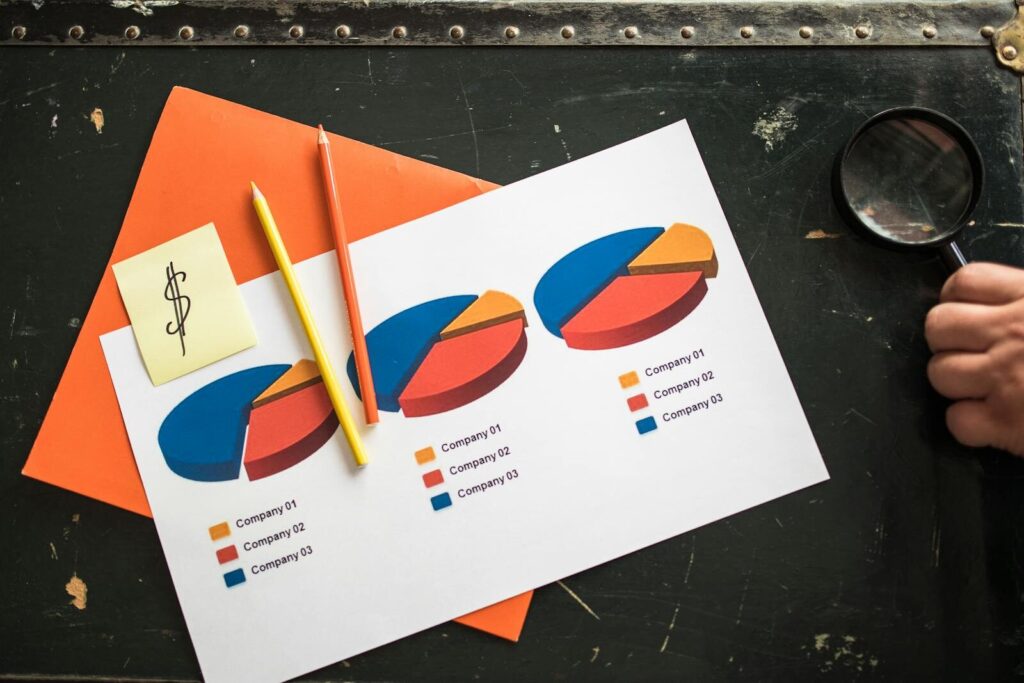 Colorful pie charts on paper with comparing backlink costs
